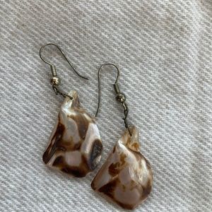 Shell pierced earrings.